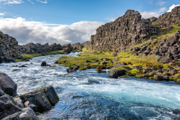 Roland Seichter Fotografie - Einzigartige Wandbilder - Fotografie mit Wasser - Fotografie des Islandwasserfalls Öxarárfoss in die Ausflussrichtung fotografiert