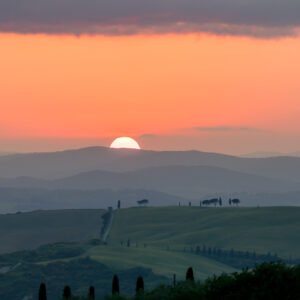 Roland Seichter Fotografie - Einzigartige Wandbilder - Landschaftsfotografie - Untergehende Sonne über den Hügeln der Toskana