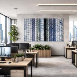 Das Wandbild Spiegelwand im 3:2 Format ergänzt ein modernes Großraumbüro durch seine strukturierte und reflektierende Glas-Ästhetik.